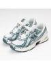 New Balance Sneakersy "740" w kolorze biało-turkusowym
