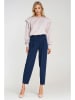 Nife Spodnie w kolorze niebieskim