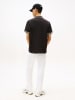 TOMMY JEANS Koszulka polo w kolorze czarnym