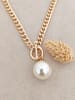 Nakkash Pozłacany naszyjnik z perłami syntetycznymi - dł. 42 cm