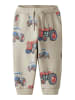 name it Spodnie dresowe w kolorze beżowym ze wzorem