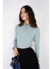C& Jo Sweter w kolorze miętowym