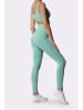 Spaio Legginsy sportowe "Adapt" w kolorze turkusowym