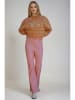 Monki Spodnie w kolorze różowym
