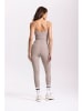 Onamaste Legginsy sportowe "Lotus" w kolorze szarobrązowym