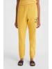 O'Neill Spodnie dresowe "Future Surf Society" w kolorze żółtym