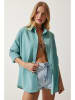 Happiness Istanbul Bluzka "Happiness Istanbul" w kolorze turkusowym