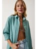 Happiness Istanbul Bluzka "Happiness Istanbul" w kolorze turkusowym
