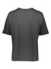 New Balance Trainingsshirt "Athletics" in Anthrazit