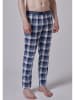 Skiny Spodnie piżamowe w kolorze niebiesko-białym