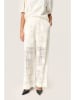 Soaked in Luxury Spodnie w kolorze kremowym