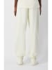 Champion Spodnie dresowe w kolorze kremowym