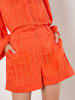 Apricot Shorts in Orange