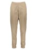 Puma Spodnie dresowe "Better Essentials" w kolorze beżowym