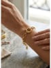 atelier MIU Vergold. Armkette mit Schmuckelement