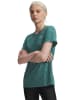 Under Armour Koszulka sportowa "Twist" w kolorze zielonym