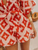 Milan Kiss Jumpsuit oranje/roze