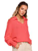 Sweter w kolorze brzoskwiniowym